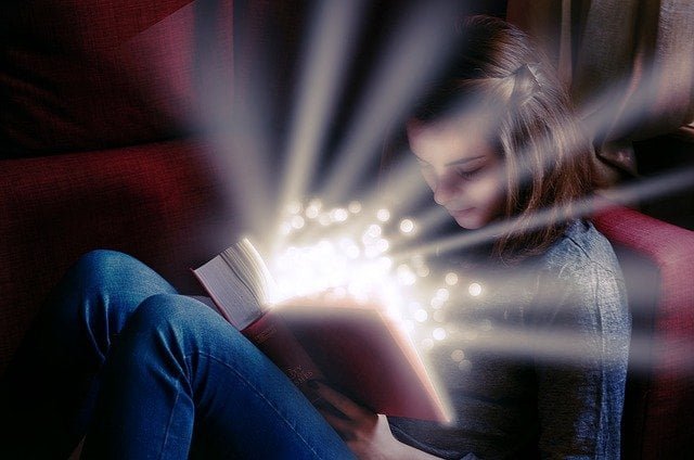 take-girl reading learn new magic book